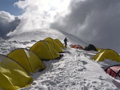 01B The tents at Ak-Sai Travel Lenin Peak Camp 3 6100m with the short distance up to the summit of Razdelnaya Peak just beyond